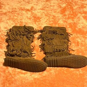 Fringed suede Minnetonka boots.  EUC
